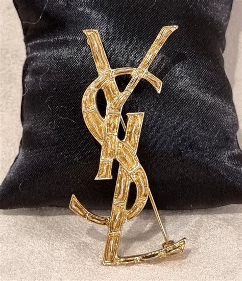 ysl brooch price.